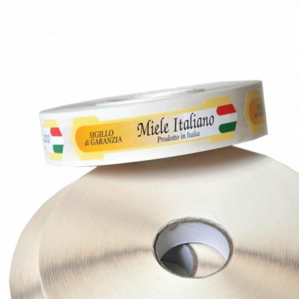 rotolo di sigilli autoadesivi grandi per vasetti miele italiano prodotti da Apicoltura com con grafica a quattro colori e bandiera italiana